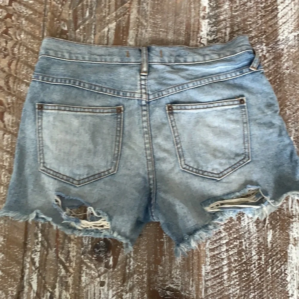 Free People distressed denim shorts
